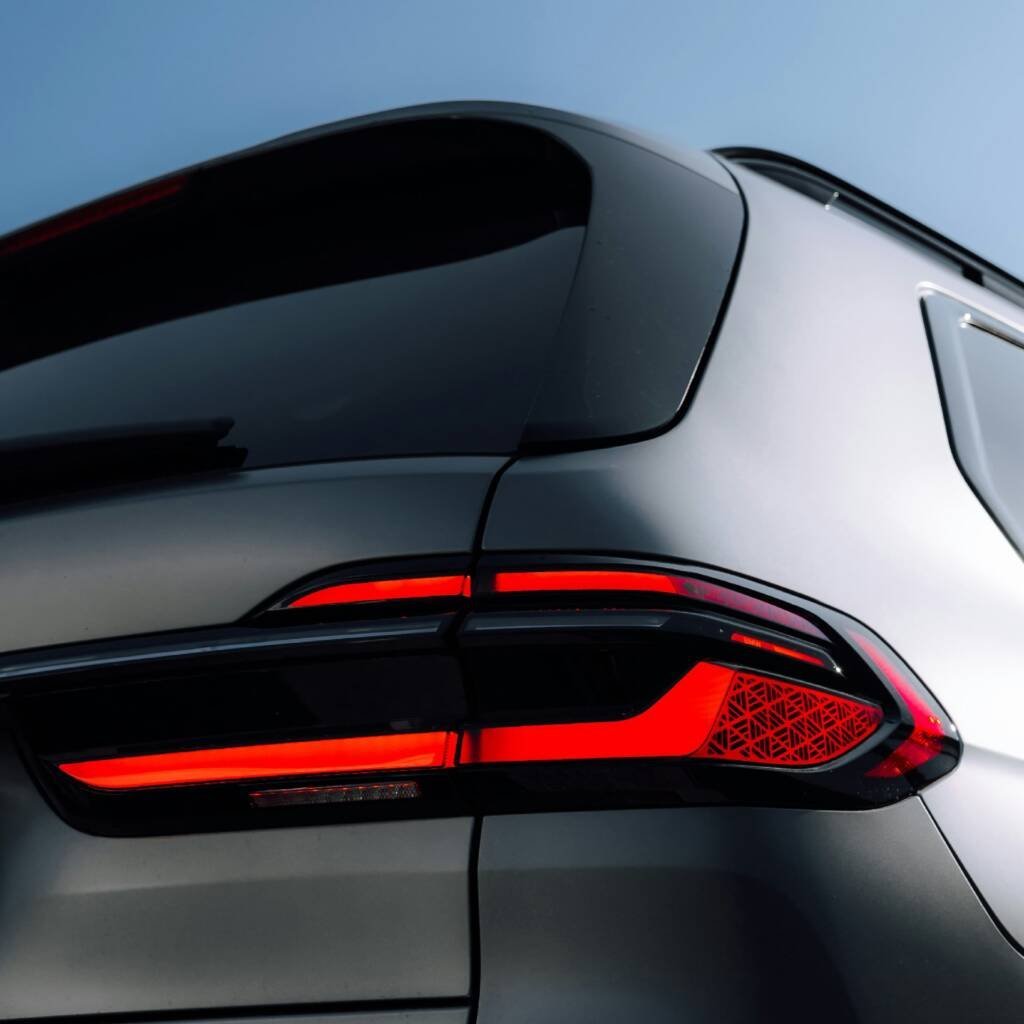 Rear LED tail light detail on a grey SUV