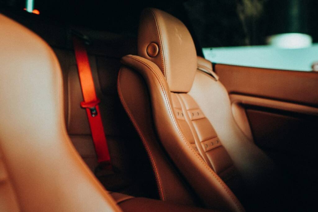 Tan leather front seats in a luxury car interior